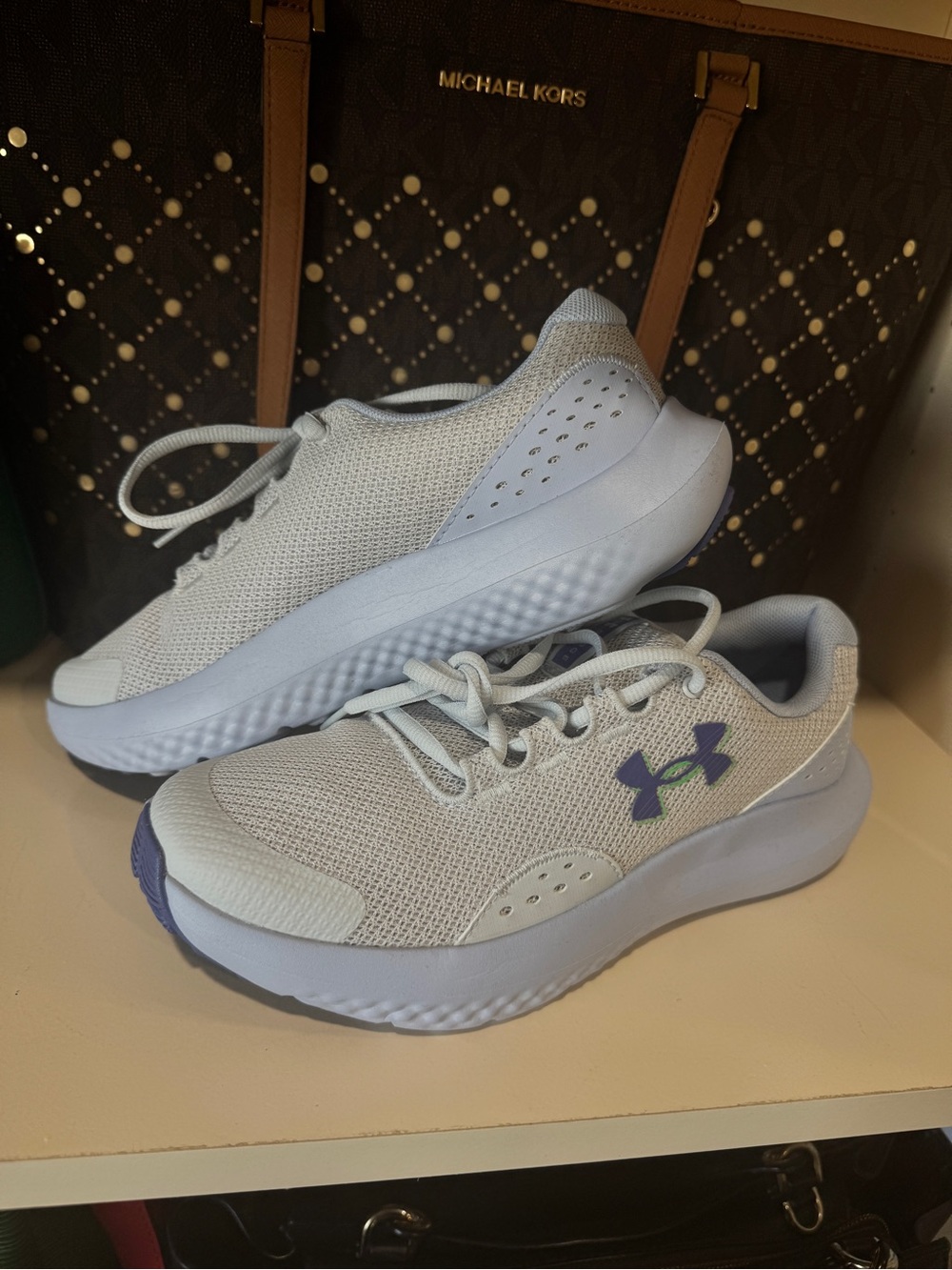 Under Armour Women’s Light Gray Mesh Athletic Sneakers with Purple Logo